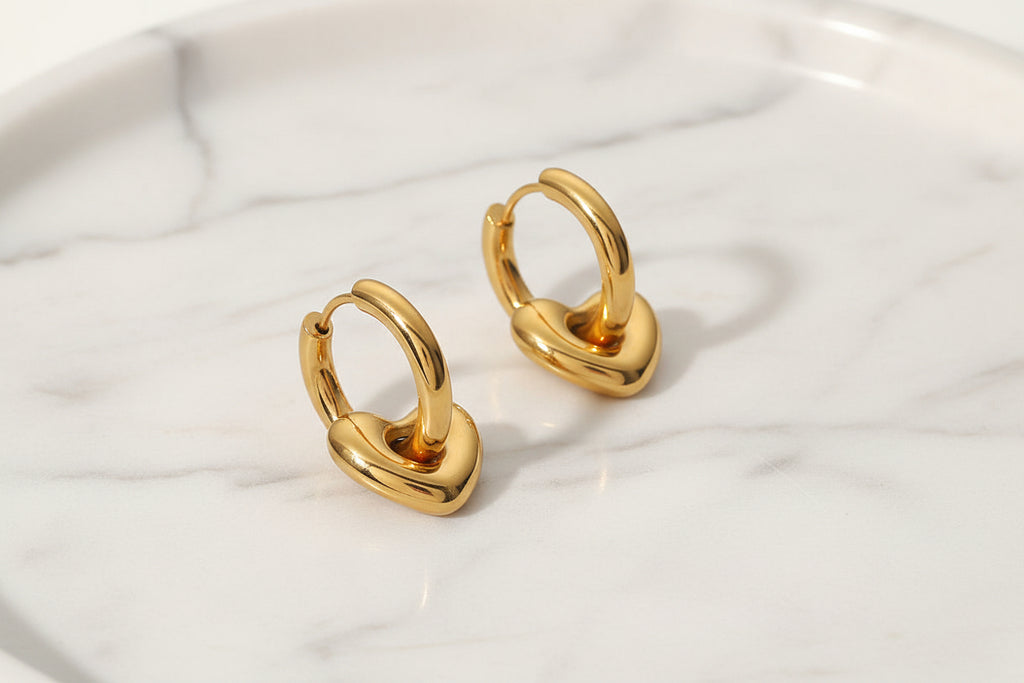 Love for Humanity Heart Hoop Earrings in 14K PVD gold plated stainless steel.